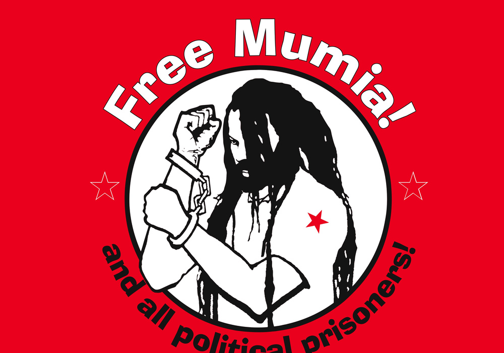 Beitragsbild: Mumia Abu-Jamal – We Want Freedom! Free Mumia. Free them all.